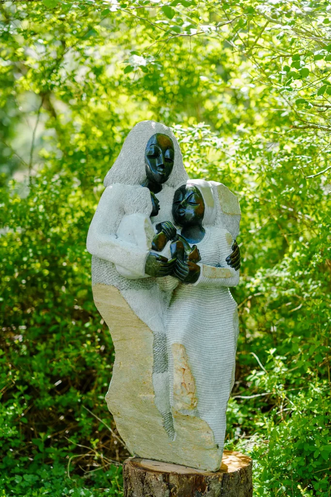 Sculpture installed in an outdoor garden setting